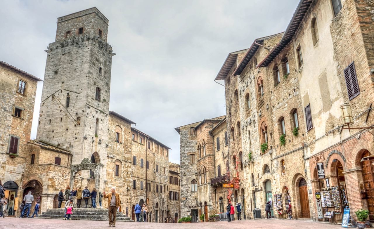 Wide view of San Gimignano's Square with its medieval well