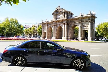 Private Transfer from Madrid Barajas Airport to City with Local Insights