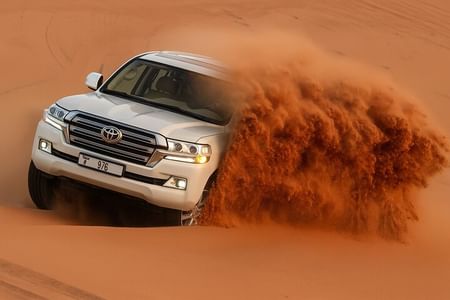 Red Dune Desert Safari with Quad Bike Dune Bashing Camel Ride BBQ