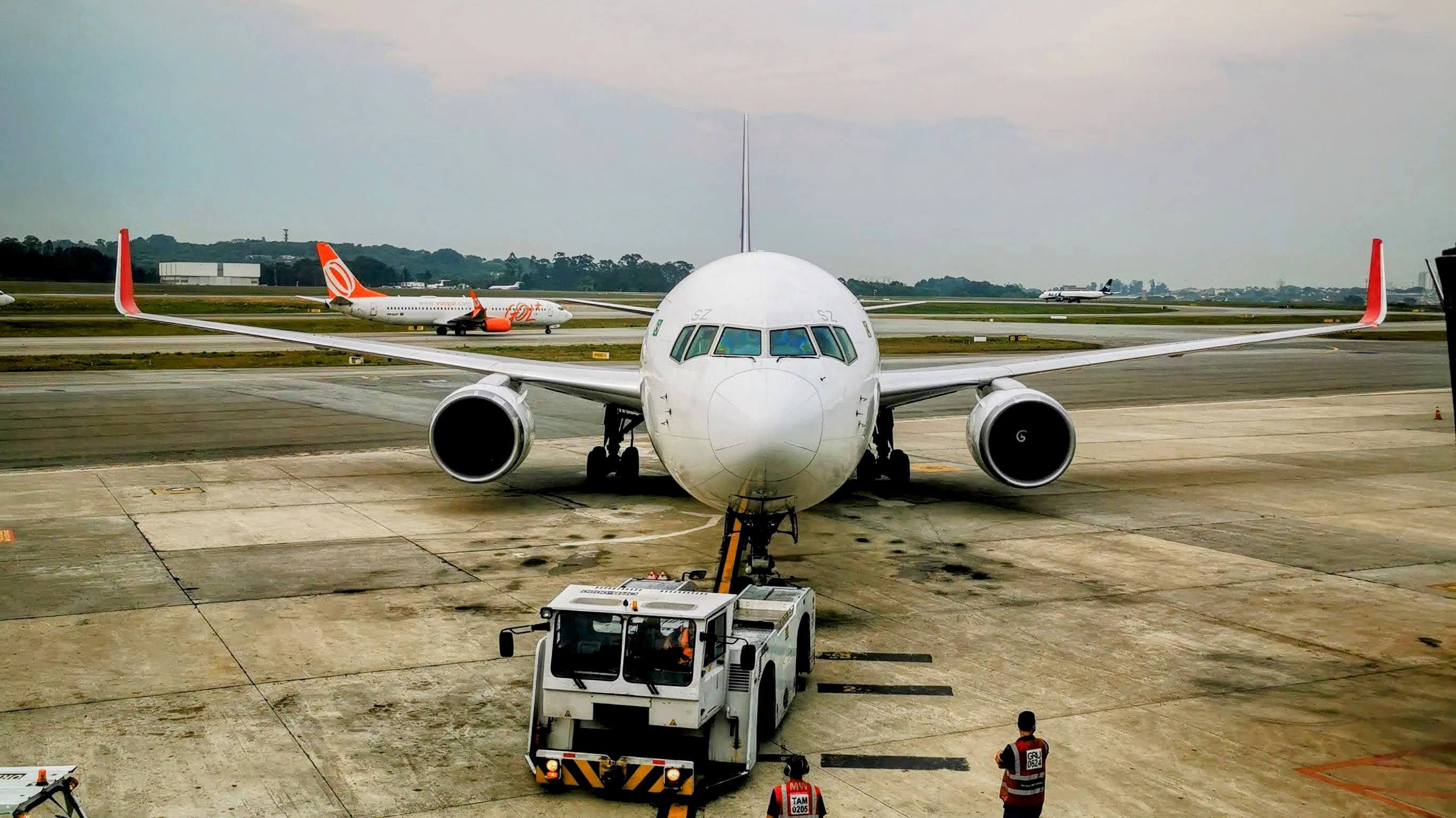 Airplane at Rio de Janeiro airport runway, representing the airport drop-off option included in the private transfer from Paraty.