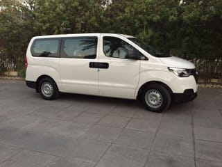 Private Transfer from Abu Dhabi Yas Island to Dubai City in Van