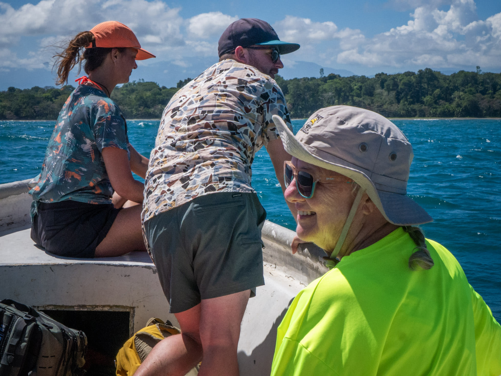 Guests enjoying a dolphin watching boat tour from Manzanillo to Punta Mona on Costa Rica's Caribbean coast.