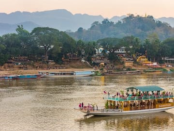 Sunset River Cruise with Local Snacks in Luang Prabang