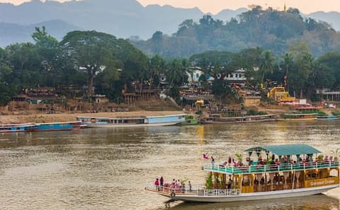 Sunset River Cruise with Local Snacks in Luang Prabang