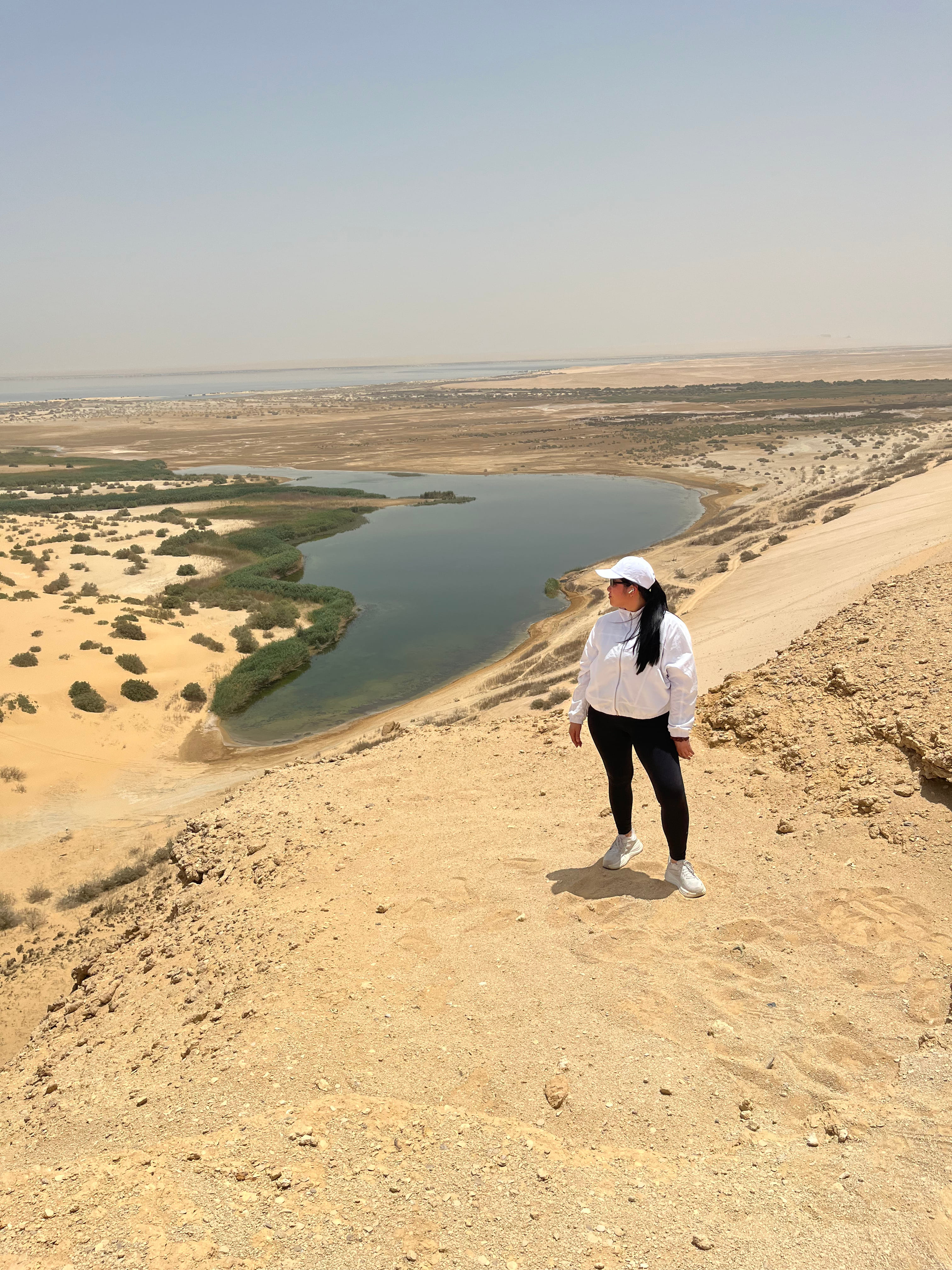 Magic Lake surrounded by desert mountains in Fayoum Egypt