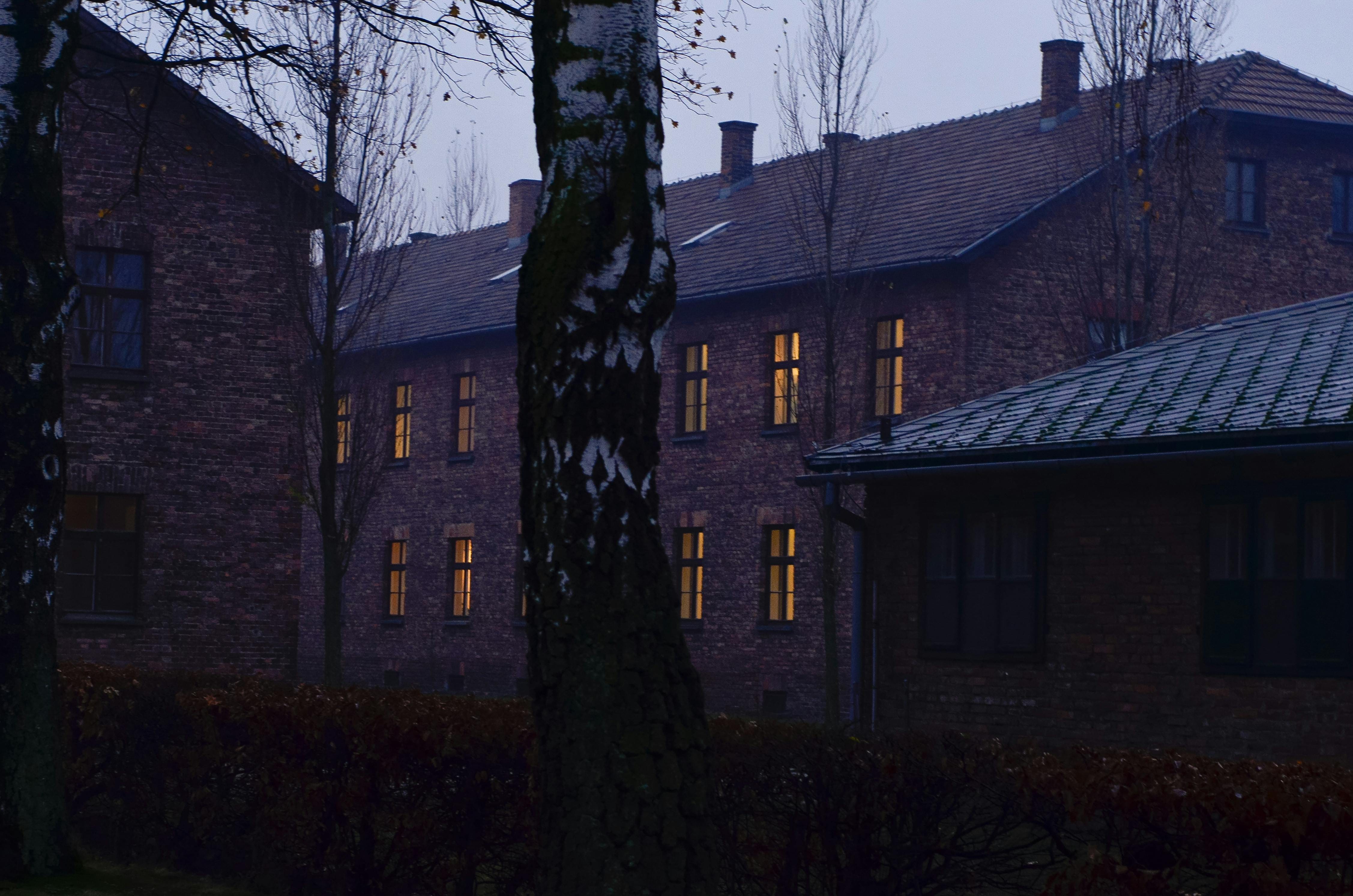 Red brick prisoner barracks at Auschwitz I in the evening light