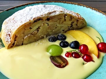 Indulge in the Heavenly Flavors of a Perfectly Baked Apple Strudel.