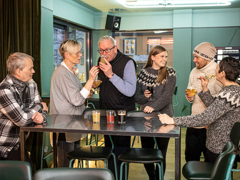 A group of guests sampling different delicious beers during The Reykjavik Beer & Booze Tour