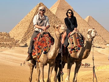 Uncover pyramids of giza with camel ride experience