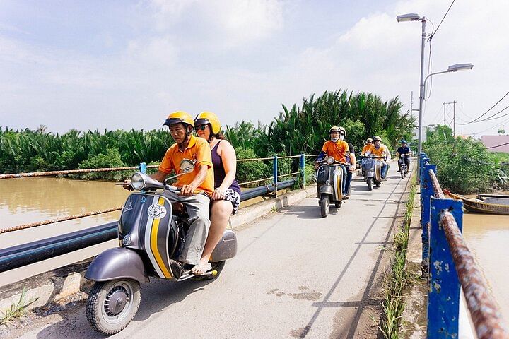 Explore the Mekong Delta by Vespa: Scenic Villages & Local Delights