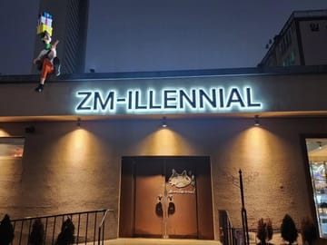 Exterior of ZM-illennial café, often visited by BTS fans.