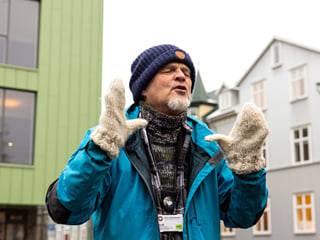 A guide from Your Friend in Reykjavik excitedly sharing a story about cats in Iceland