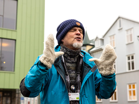 A guide from Your Friend in Reykjavik excitedly sharing a story about cats in Iceland