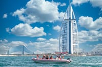 Grab the perfect postcard shot! Witness Dubai's icons like the magnificent Burj Al Arab from the water on the thrilling Dubai Speedboat: Iconic Marina to Atlantis Adventure Ride!