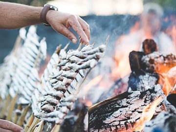 Sardines On Skewers Show Cooking in Malaga beach