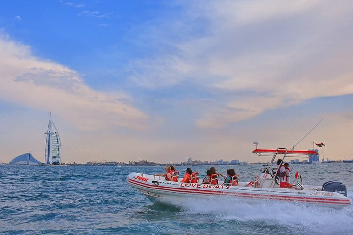 Golden hour skyline cruise! Experience high-speed thrills and incredible views of the Ain Dubai and JBR skyline at sunset on your Dubai Speedboat: Marina, JBR &amp; Ain Dubai Skyline Cruise!