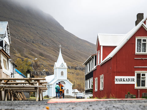 Colorful houses nestled between fjords in East Iceland’s most charming village.