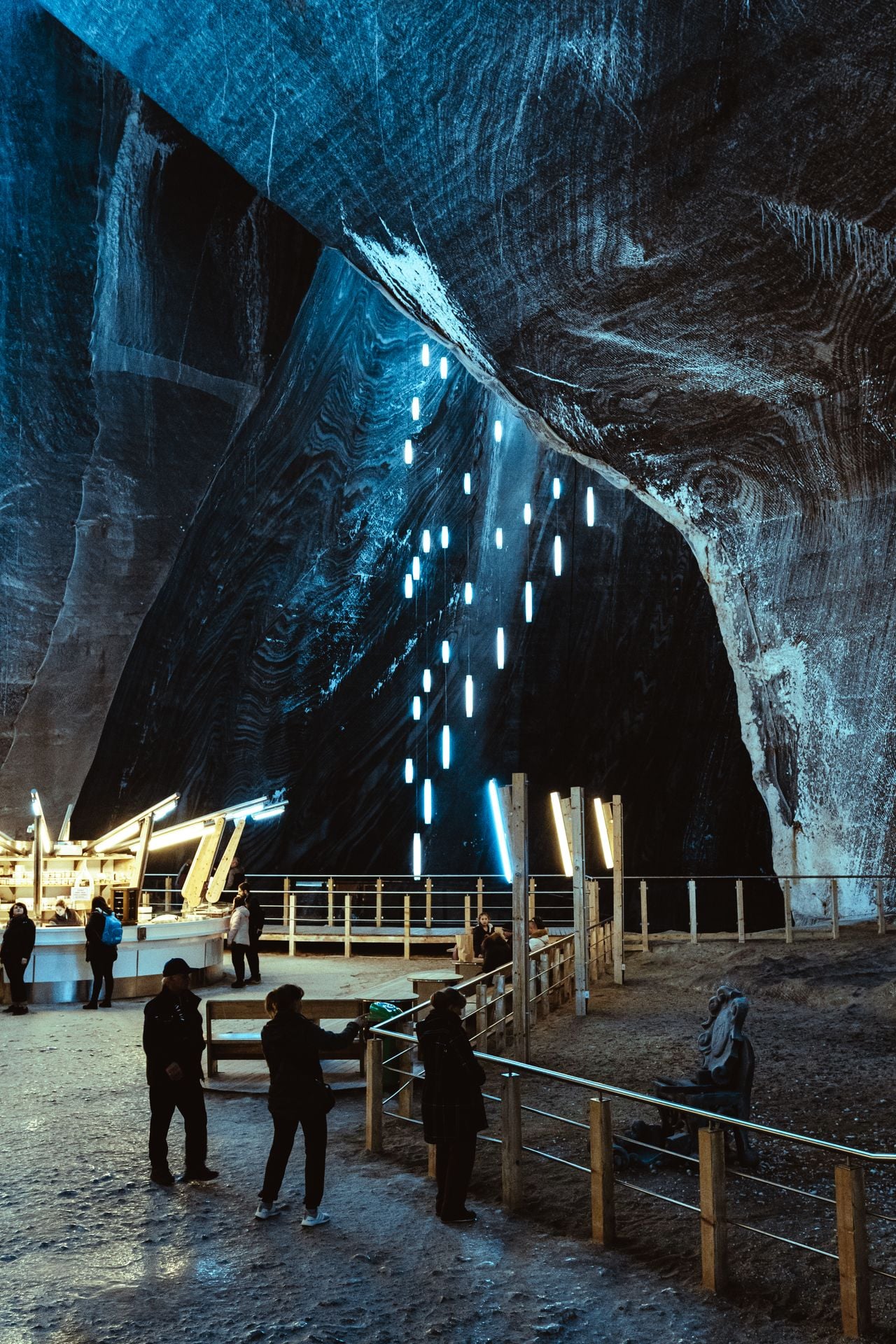 Illuminated underground salt lake chamber at Wieliczka Salt Mine