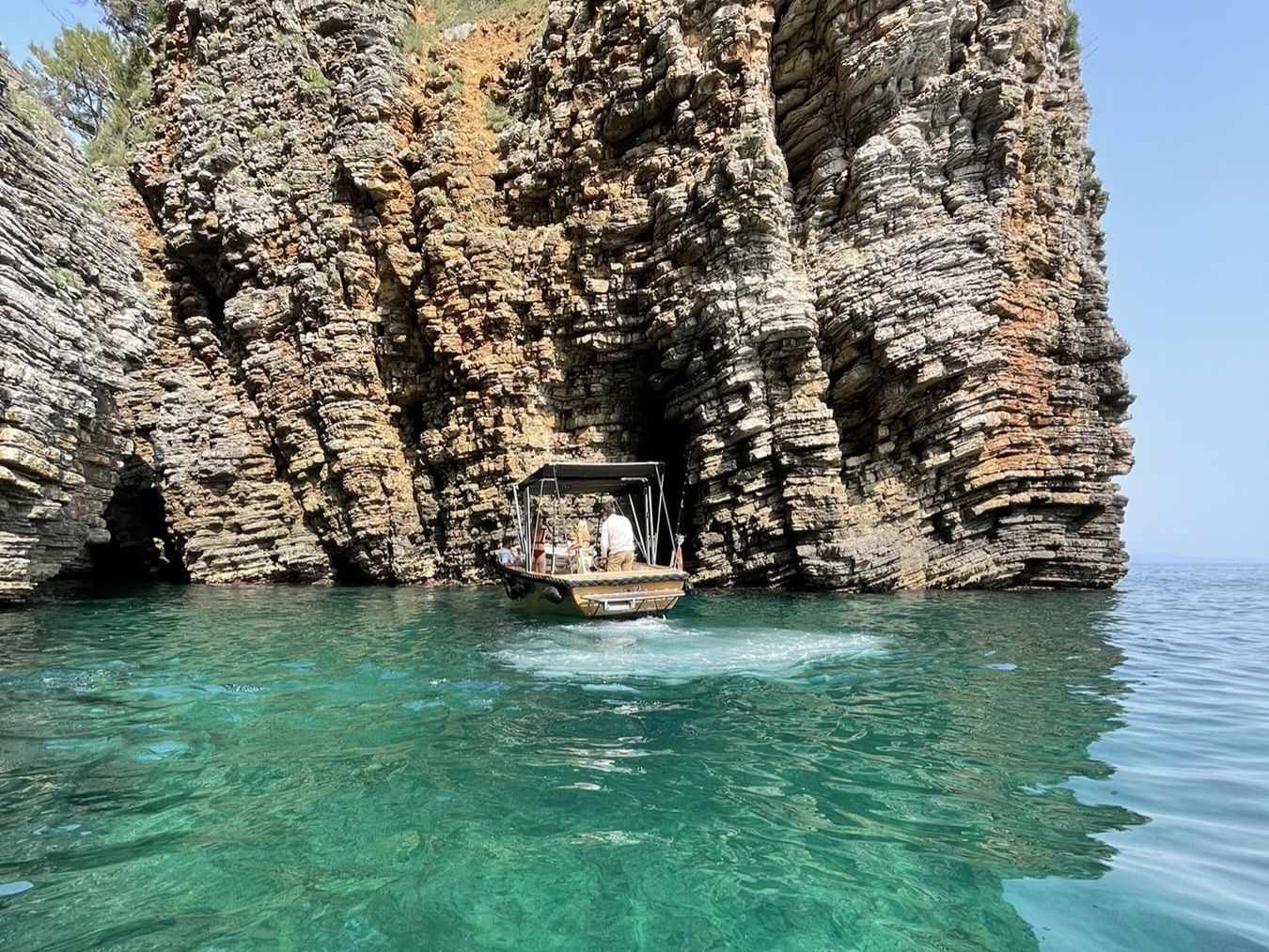 This boat tour offers the perfect mix of breathtaking views, swimming stops, and exploration of iconic landmarks.