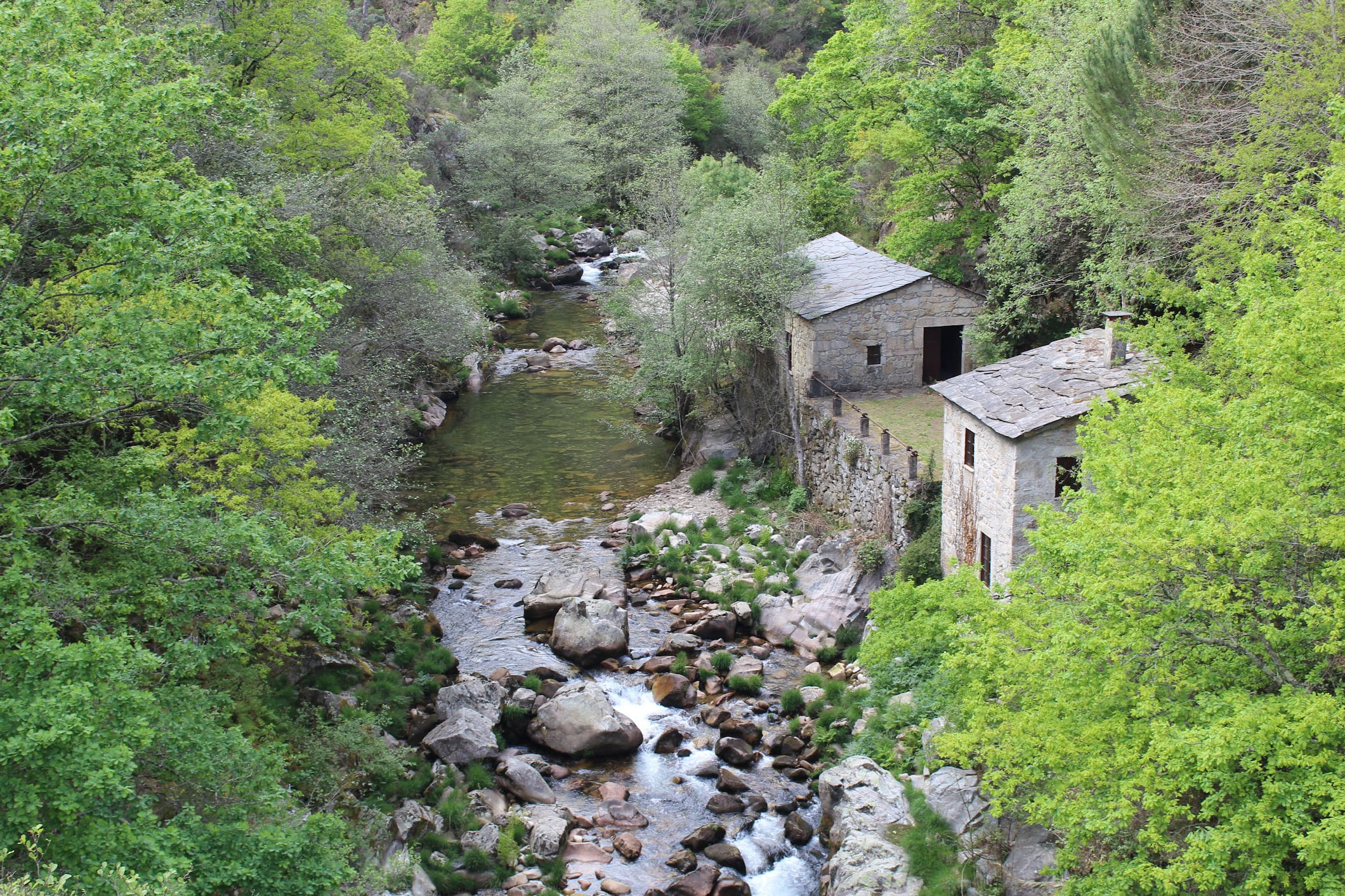 The Teixeira River flowing through the granite landscape.