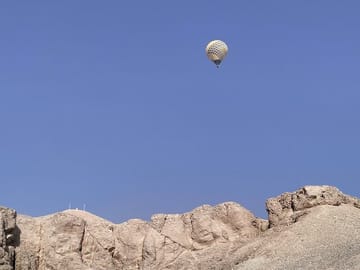 Hot air balloon on top of valley of the kings Luxor Egypt