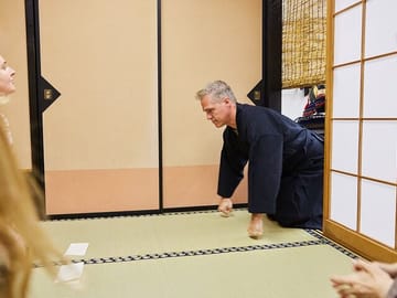 After depositing the Japanese sword in the sword hanger outside, one enters through the nijiriguchi (entrance to the tea room) with head bowed, knees down, and body shrunken.