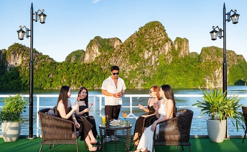 Luxury Ha Long Bay Day Cruise: Cave, Island, Kayak & Sunset Party