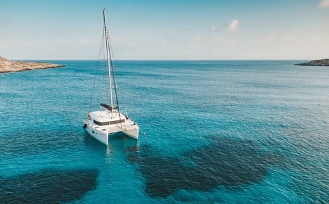 Small Group Catamaran Cruise with BBQ in Santorini
