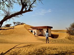 Private Ghost Village Safari Tour with Dune Bashing and Sandboarding 