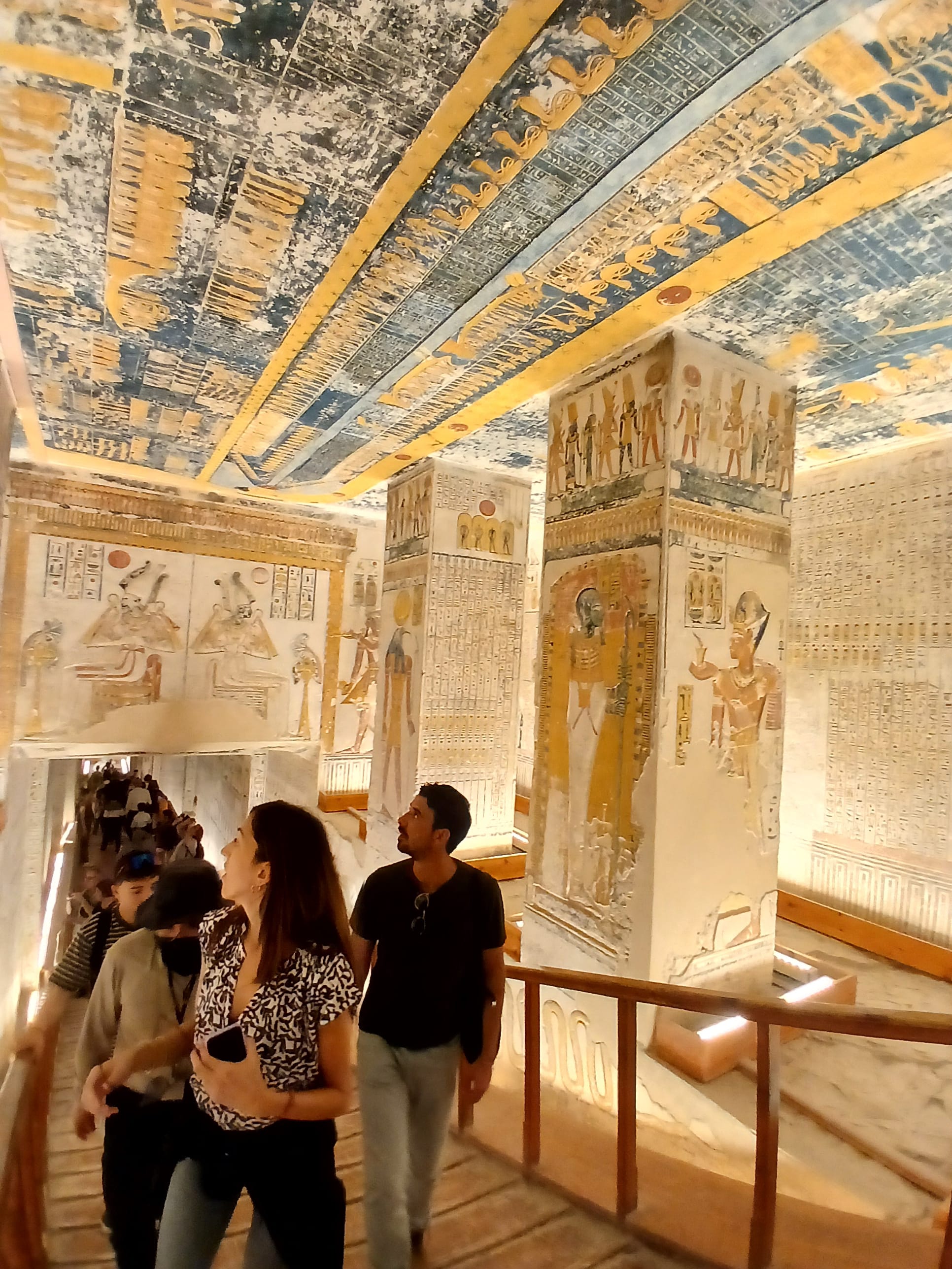 Illuminated painted pillars and astronomical ceiling inside Seti I tomb