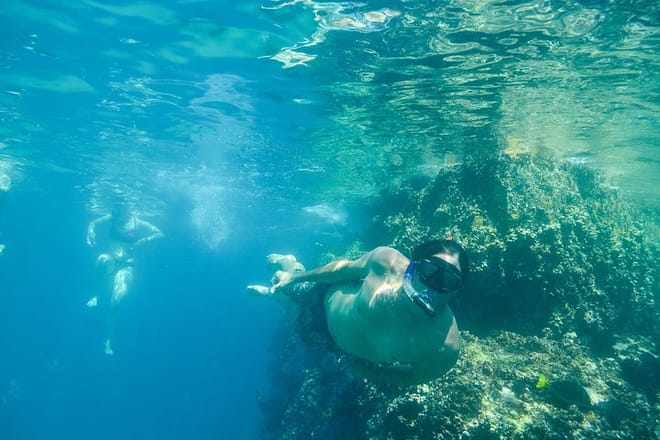 Snorkeler exploring reef in Santa Maria and Chileno Bay Los Cabos