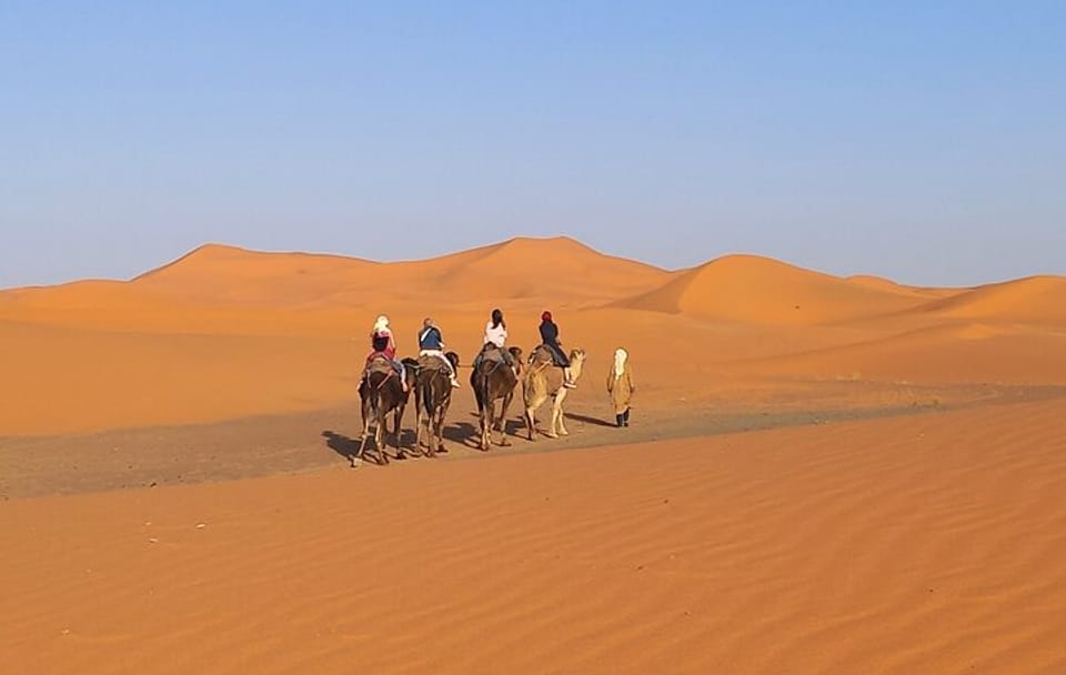 Camel Ride at Sunset in Merzouga Dunes, Morocco