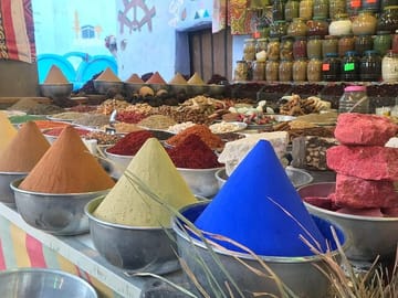 "Aswan Essence: Spiritual Sites, Sunset Cafe & Bazaar Adventure"