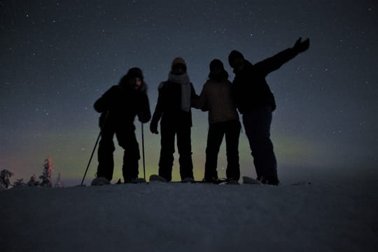 Snowshoeing Under the Auroras