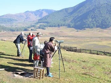 Birdwatchers at Phobjikha valley in western Bhutan