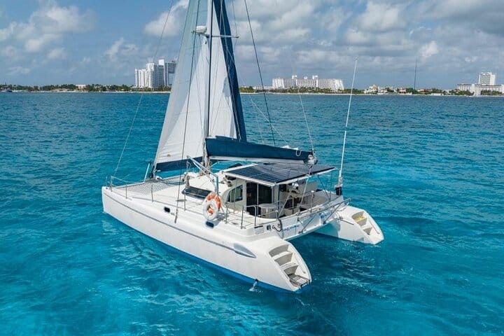 This private Cancun Catamaran cruise offers a luxury day at sea, complete with spectacular snorkeling and a premium open bar!