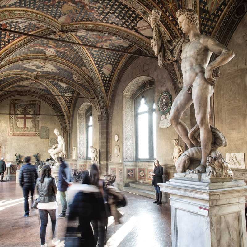 View of one of the halls of Bargello Museum with its frescoed ceilings and sculptures