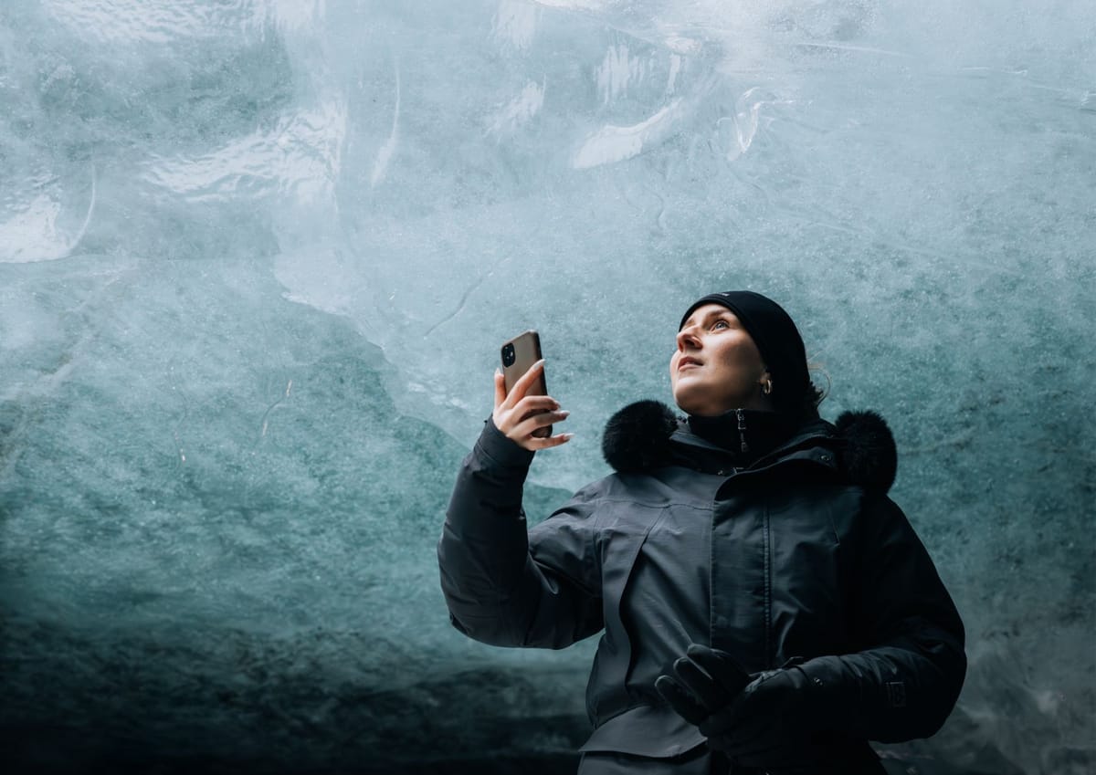 Standing in the blue ice of a natural ice cave