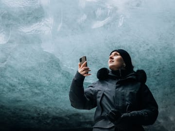 Standing in the blue ice of a natural ice cave