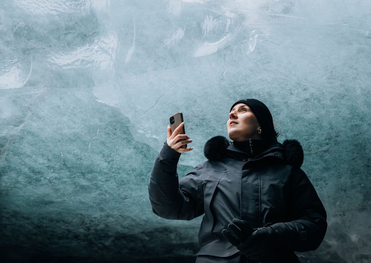 Standing in the blue ice of a natural ice cave