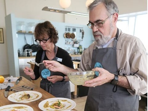 Plating the first course at Salt Eldhus cookery school