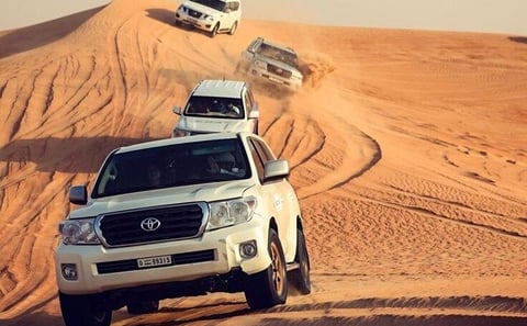 Dubai Desert Safari, Dune Bashing, Camel Ride, Sandboarding & BBQ