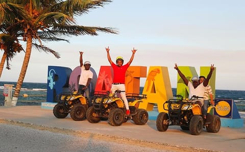 ATV Sunset Tour in Coxen Hole and West End, Honduras