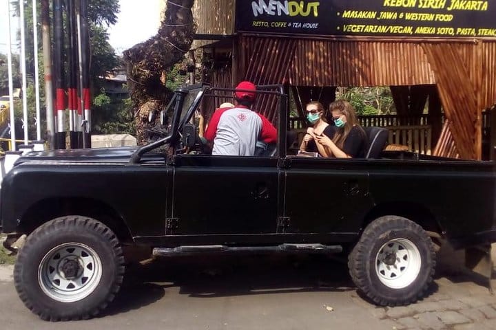 a briefing before driving off the volcano