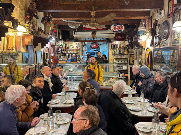 Indulging in authentic Maltese food and drink at several stops along the tour