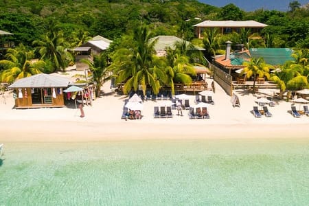 Ultimate West Bay Beach Day: Pass & Transfers Included