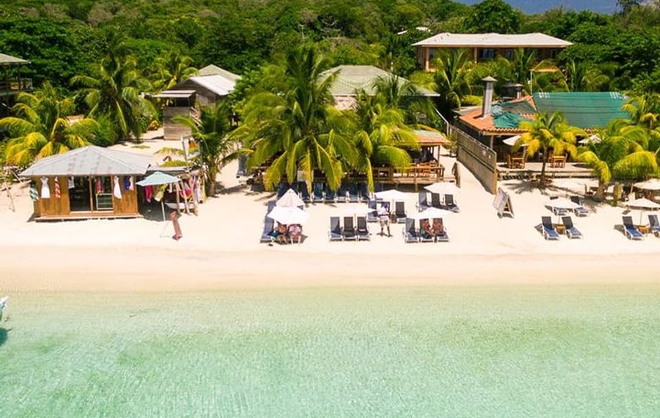 Ultimate West Bay Beach Day: Pass & Transfers Included