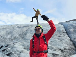 Playing with illusion on the glacier, "little man - big man".