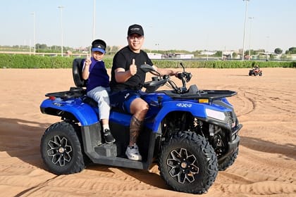 Short Desert Tour with Quad Bike Camel Ride Sandboard & Sunset