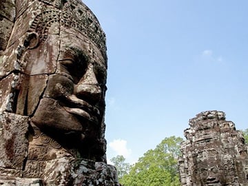 Magnificient Sunrise and Legend of Angkor Half Day Tour